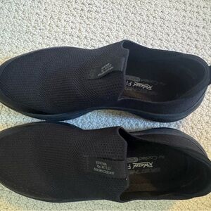 Skechers women’s Black Mesh Slip-Ons